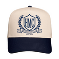 Beige and navy cap with 'HMC Hot Moms Club' logo on a white background