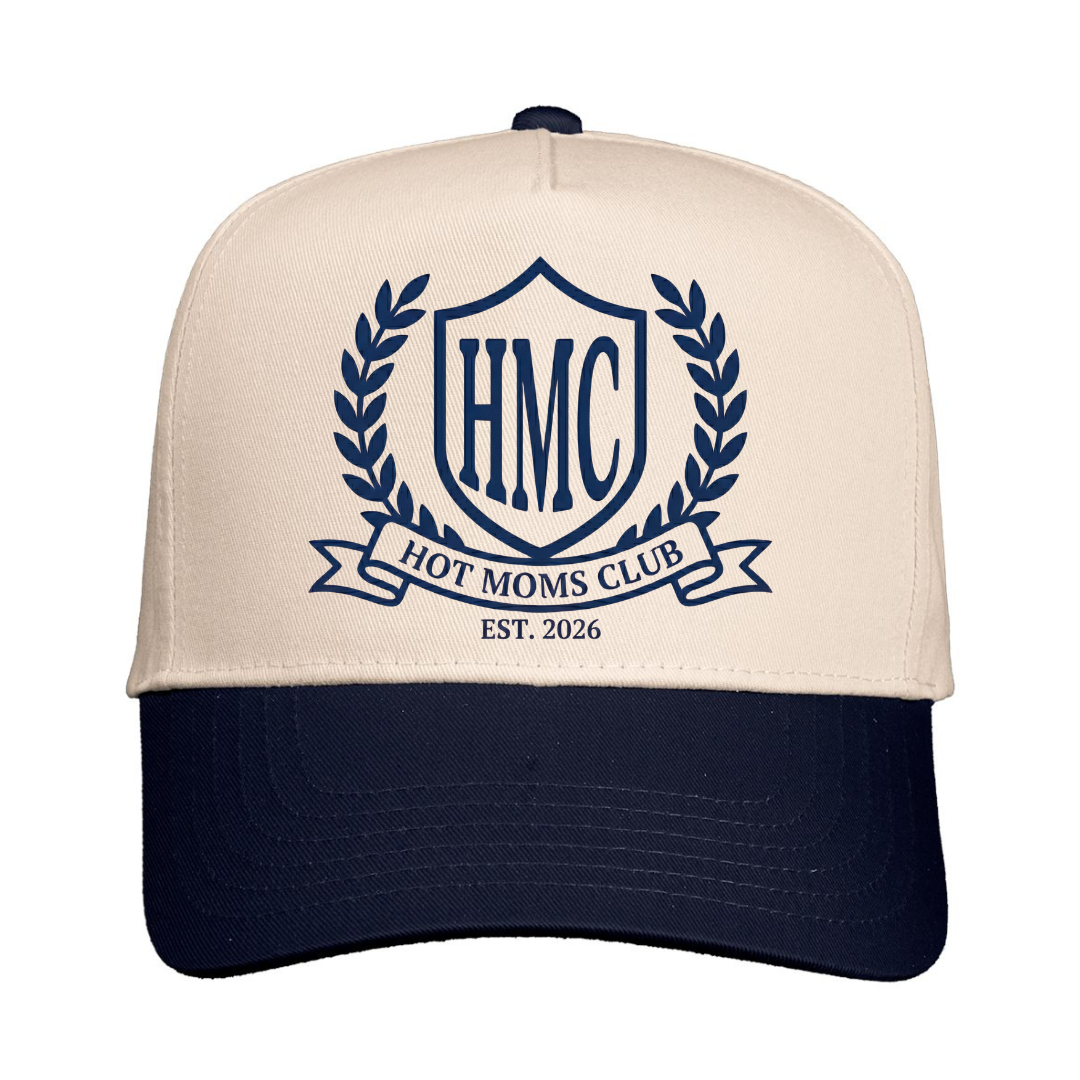 Beige and navy cap with 'HMC Hot Moms Club' logo on a white background