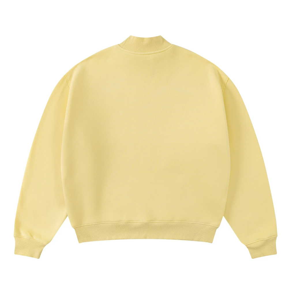 Light yellow sweatshirt on a white background